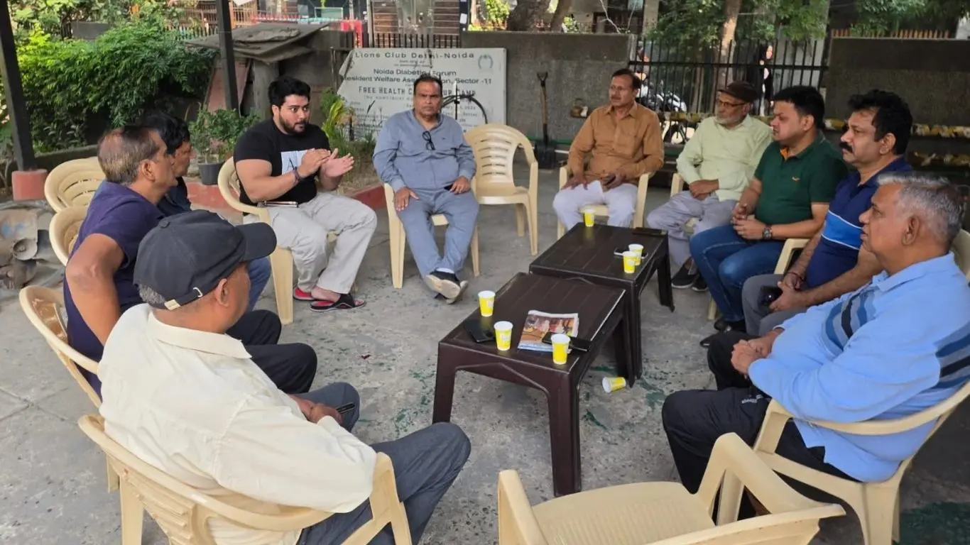 RWA office-bearers and local residents holding a meeting regarding water and street light issues in Noida Sector-11